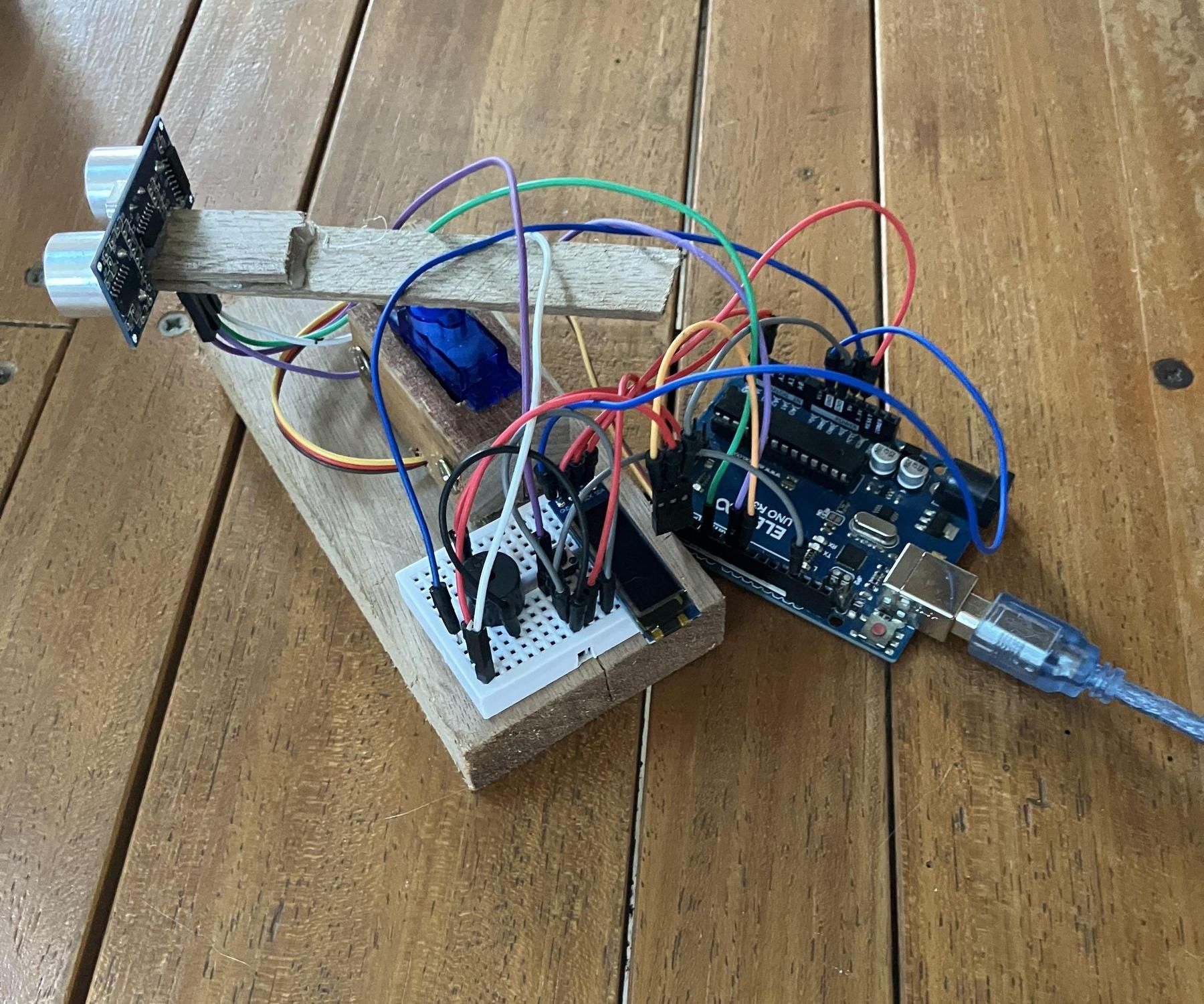 Distance Sensor With Oled and Piezo Buzzer