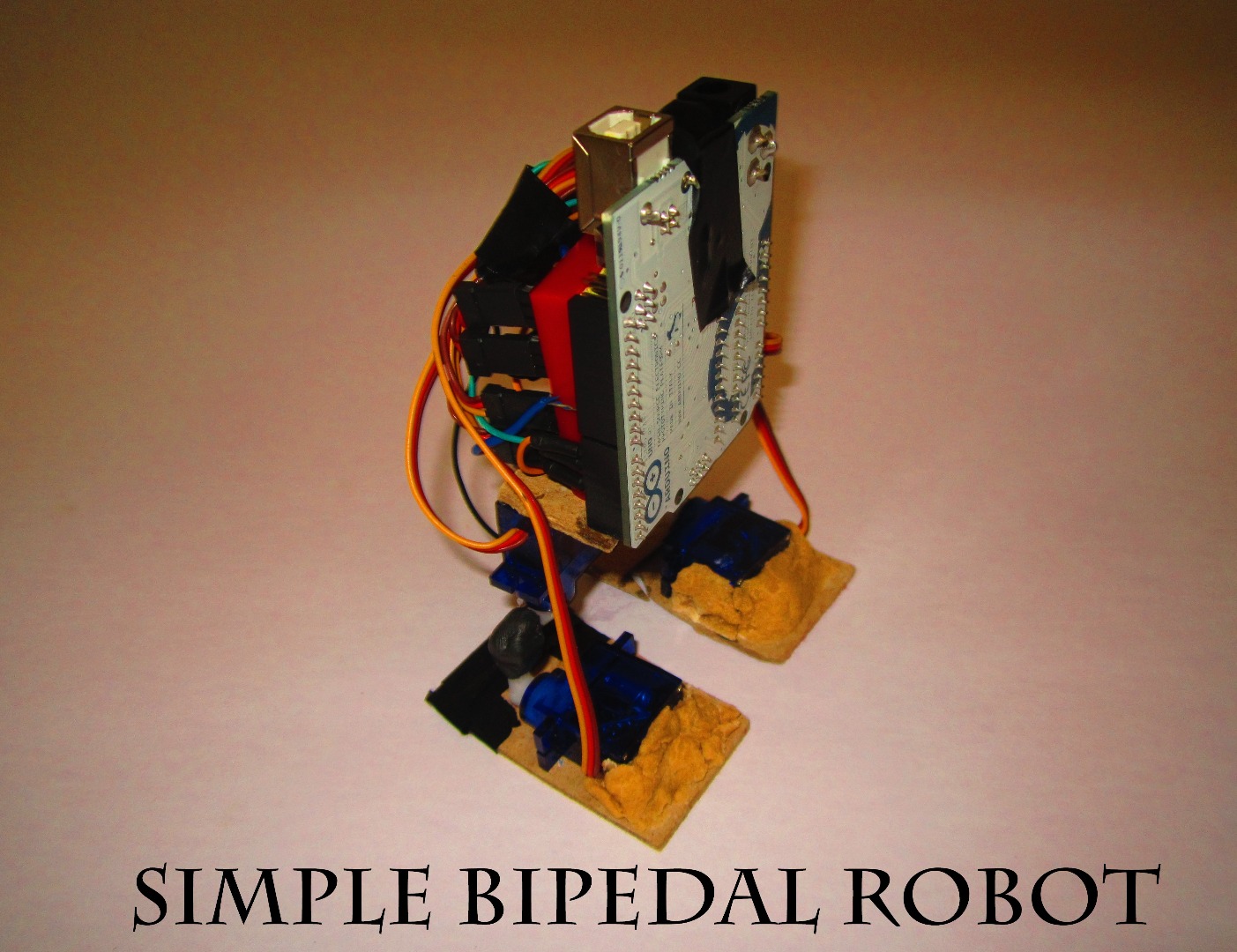 Make a Simple Bipedal Humanoid Robot (Servo Walking Robot)