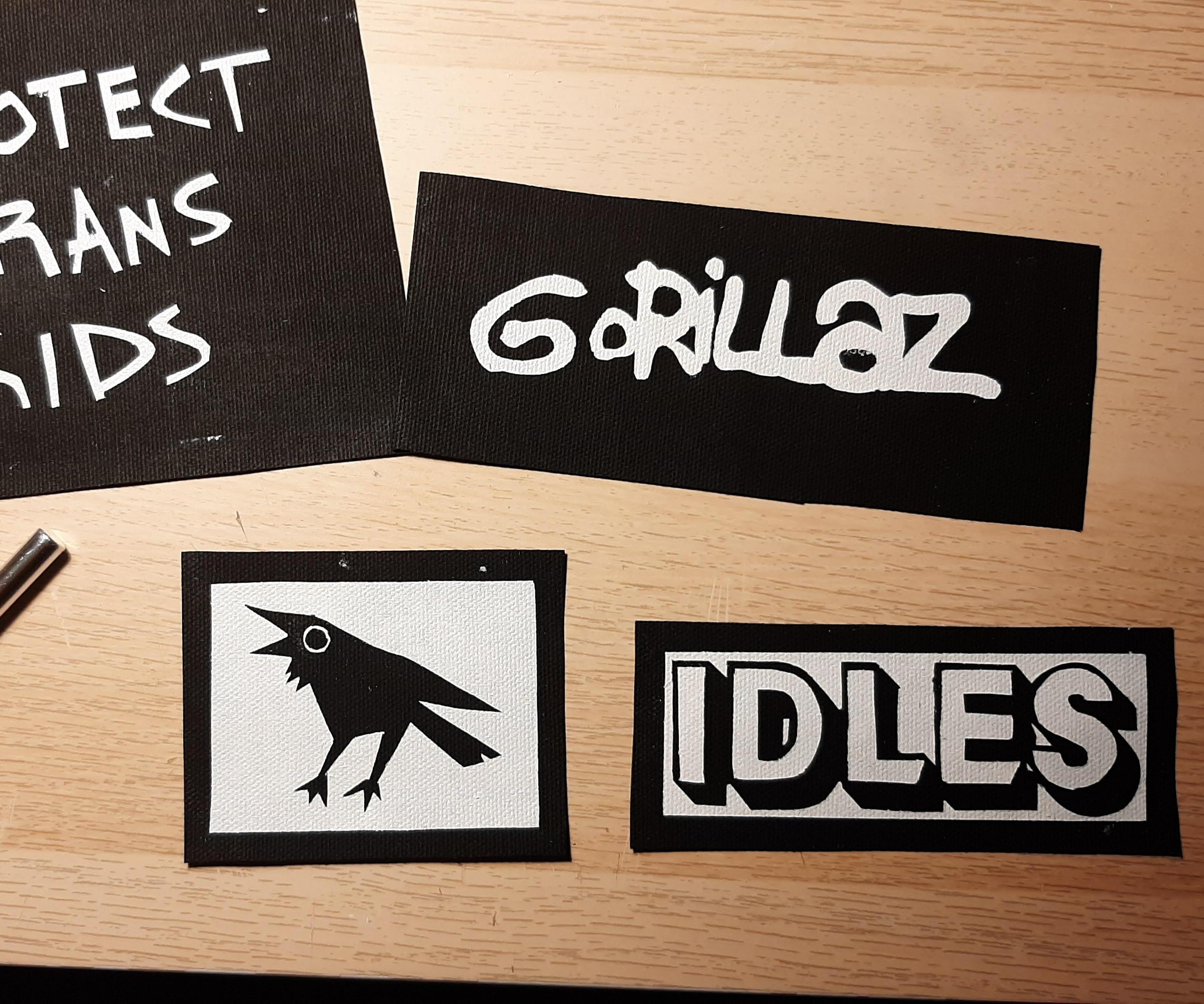 Canvas patches with masking tape and fabric paint