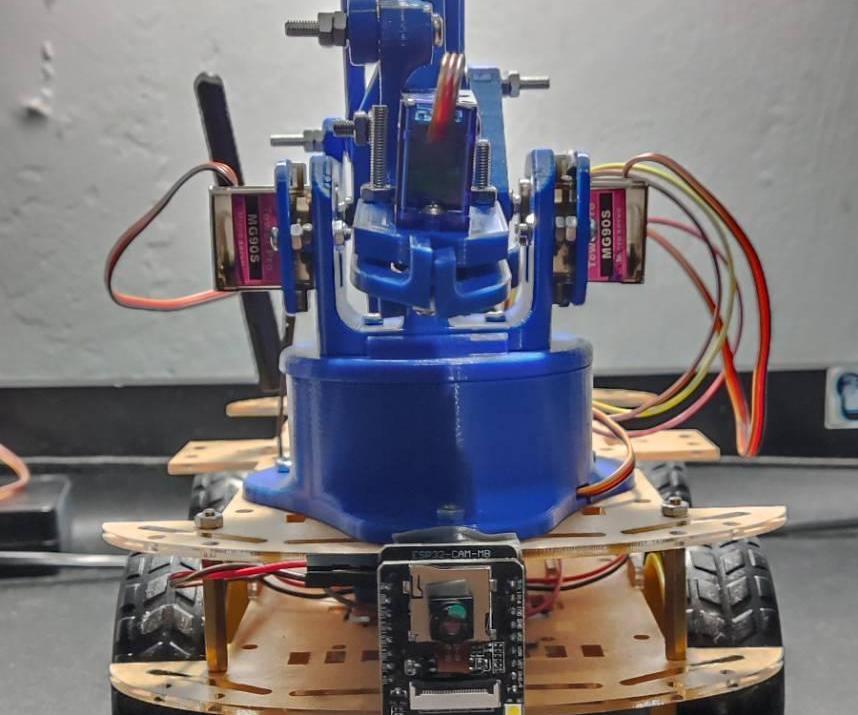Surveillance Robot With Robotic Arm