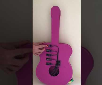 Guitar With Button and Pinoo