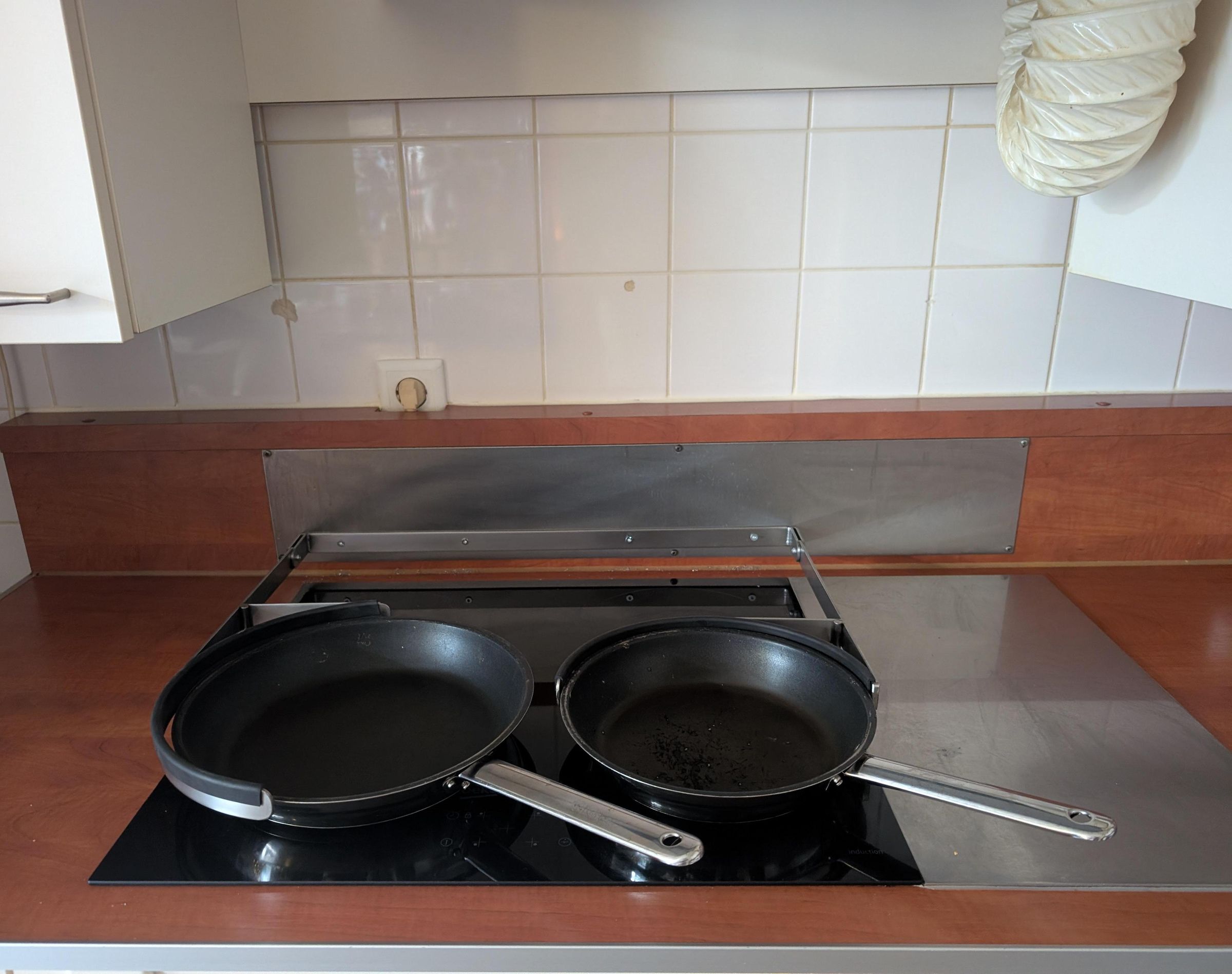 Opklapbare Panbeugel Voor 2 Koekenpannen