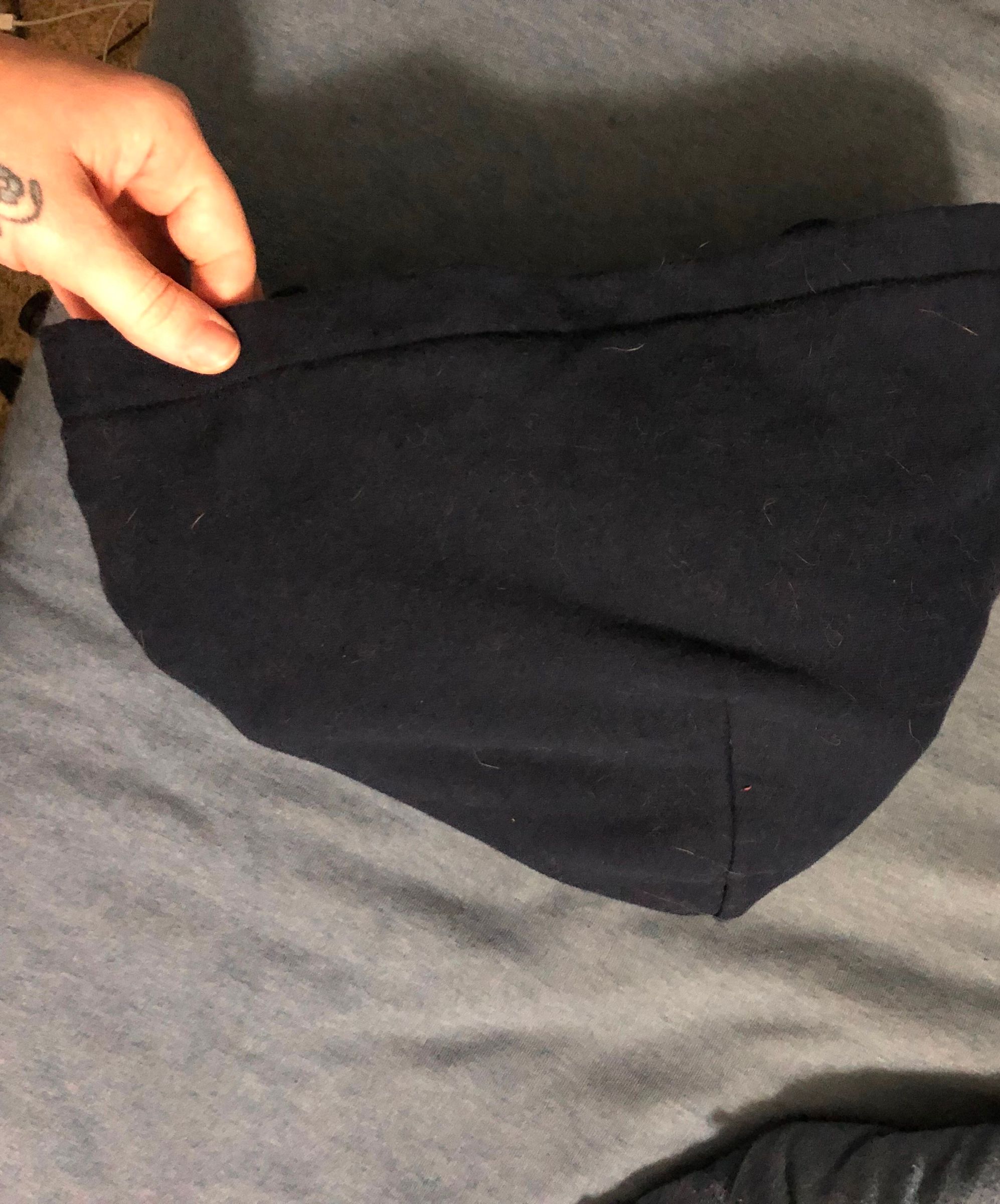 How to make a make shift pillow with only a hooded sweatshirt 