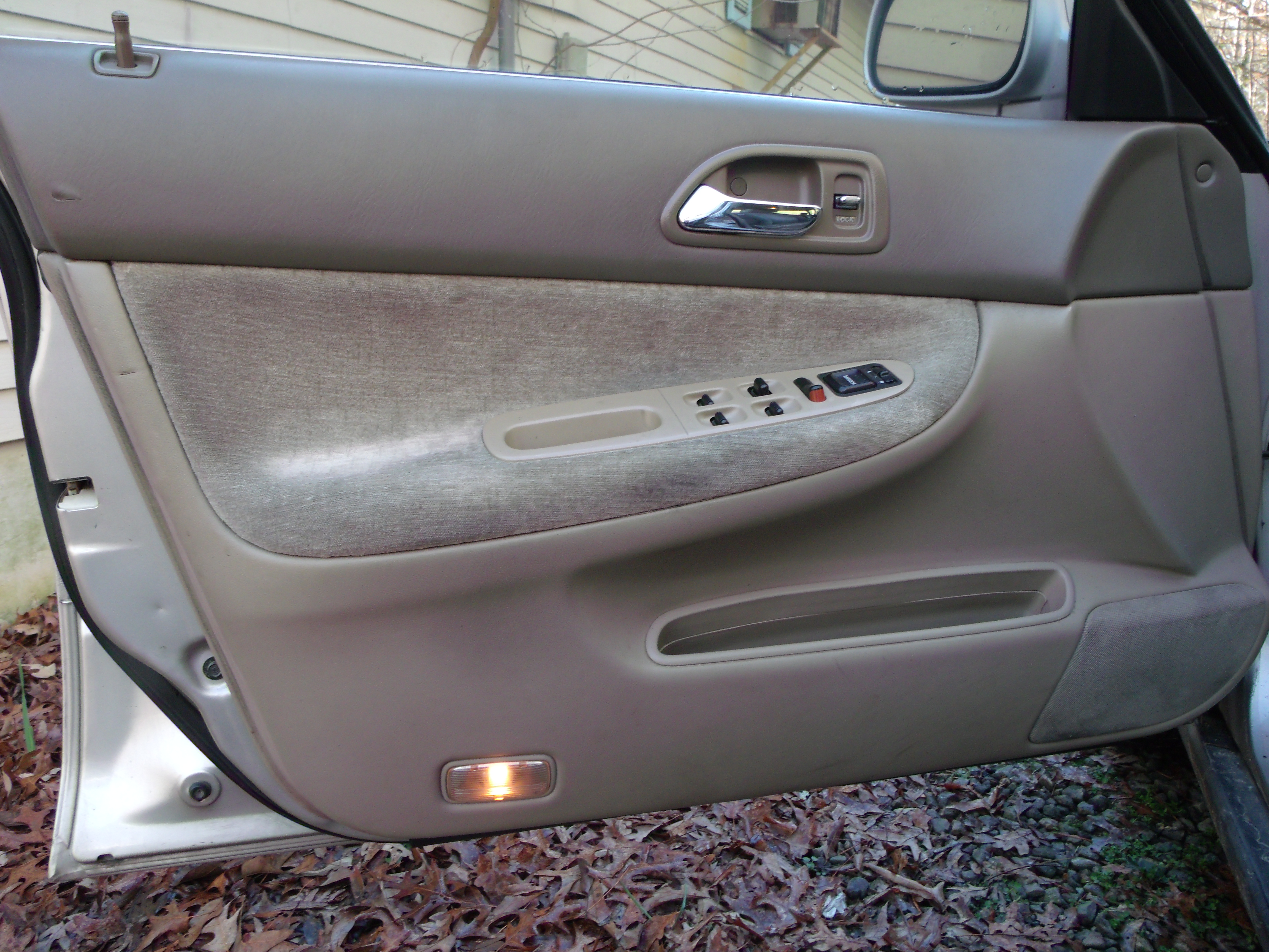 How to Remove Your Car's Door Arm Rest.