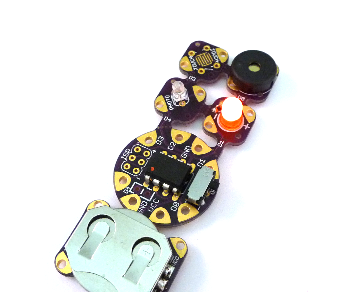 SnapNsew: a Soft-Circuit / Embedded Electronic Project