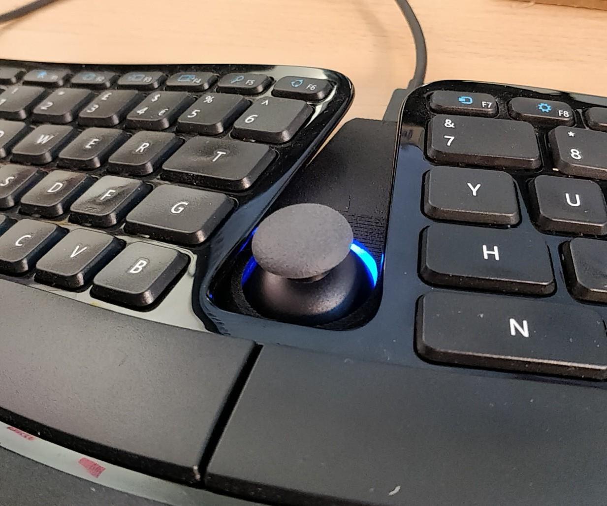 Mode Switcher for Talon Voice That Fits in the Gap of a Microsoft Sculpt Keyboard.