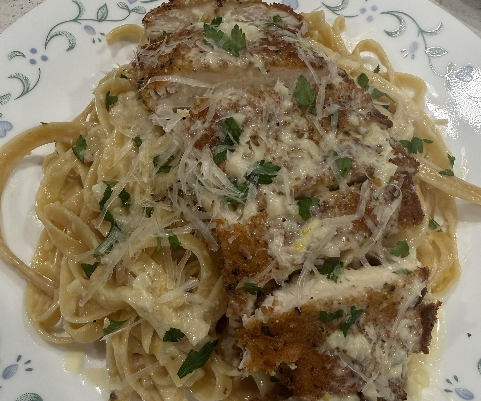 Crispy Chicken Served Over Creamy Lemon Alfredo Fettuccine