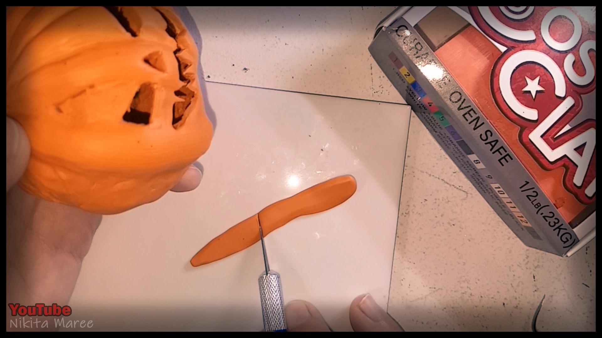 How to make a Jack o'lantern. Polymer clay tutorial. Sculpting a pumpkin out of clay. Halloween Craft.  (21).jpg