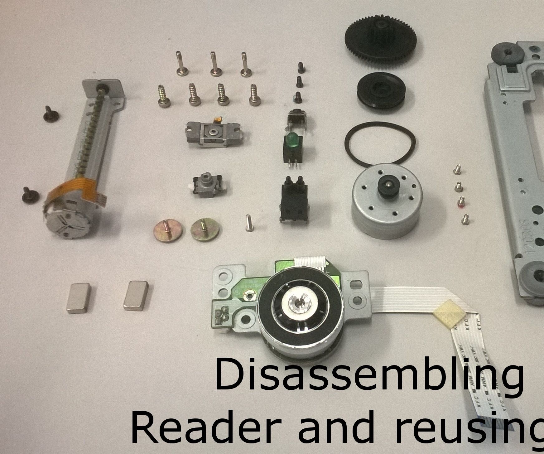 Disassembling a CD/DVD Reader and Reusing Its Parts